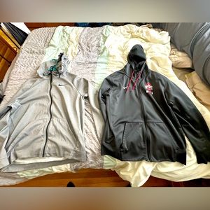 2 men’s size XL zip up Nike Hoodies. One Nike only, one Ohio State Nike